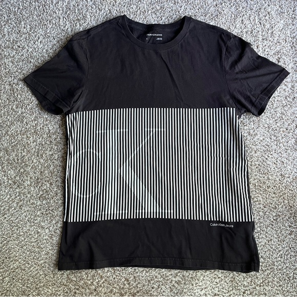 EUC Men's Calvin Klein Jeans Graphic Tee Shirt size Medium in Black - Picture 1 of 4